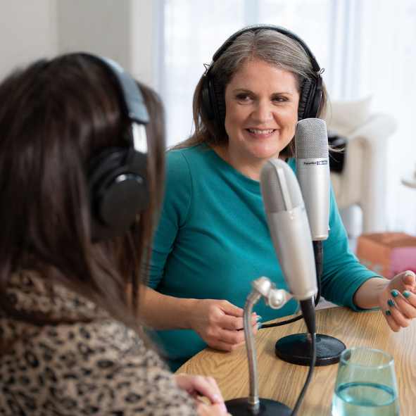 Laura McRae chatting on a podcast