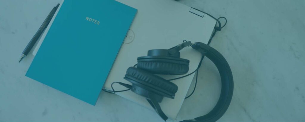 headphones, laptop and notebook